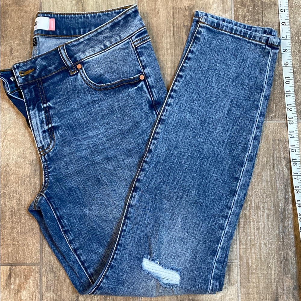 Cabi distressed skinny jeans.